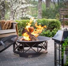 Article Wood Burning Fire Pit Buying Guide From Hayneedle Com Wood Fire Firepit In 2020 Wood Burning Fire Pit Fire Pit Backyard Fire Pit