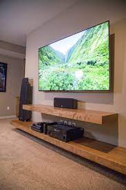 However, many homes today will only have one larger. 17 Diy Entertainment Center Ideas And Designs For Your New Home Enthusiasthome Floating Shelves Living Room Living Room Tv Wall Living Room Tv
