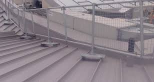 Most roof anchor points can be connected onto standing seam roofs using a clamping. Metal Roof Guardrail Install With Mesh Panels On Roof Kee Safety Ae