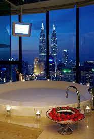 Breathtaking View Of The Kuala Lumpur Skyline From Your Very Own Bubble Bath In The Hotel Suite Unique Hotel Rooms Dream Bathrooms Dream House