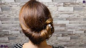 Tie all the hair in a simple ponytail at first, then. Beautiful Summer Bun With Flowers Hairstyle