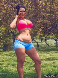 Porn image of voyeur sports bra big ass long legs chubby short shorts  laughing created by AI