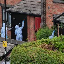 Man appears in court charged with murder over bodies found in suitcases