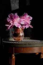 Metal flower sign fresh cut flowers features e mbossed letters with aged paint for the perfect rustic style finish. Fresh Cut Pink Peonies In Vintage Copper Vase Background Flowers Stock Photo 178861420