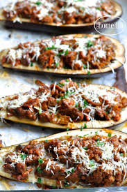 A Healthier Take On Eggplant Parmesan These Stuffed Eggplant Parmesan Boats Are Overflowing With A Thick And He Eggplant Parmesan Rib Recipes Eggplant Recipes