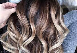 Take a 1 inch (2.5 cm) piece of hair and use the applicator brush to spread the bleach from the tips to about 1 inch (2.5 cm) from your scalp, leaving the roots untouched. Found 33 Prettiest Ways To Have Dark Hair With Blonde Highlights