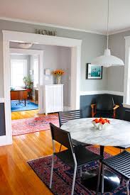 This is especially true in a living room with walls in bright colors or wallpaper prints. Drew Amp Mindy S Delightful Mix In Melrose House Tour Dining Room Paint Two Tone Dining Room Home