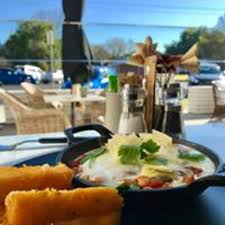 Combine water, polenta, herbs (if using), and 3/4 teaspoon salt in a heavy medium saucepan and bring to a boil over medium heat, whisking. Baked Eggs With Chorizo White Bean Ragu And Polenta Chips Picture Of Bertsy Co Wangaratta Tripadvisor
