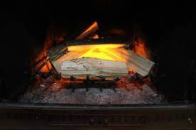 Span, giving the appearance of sourceless candle flames. Fake That Fireplace Flicker With Flame Bulbs Hackaday