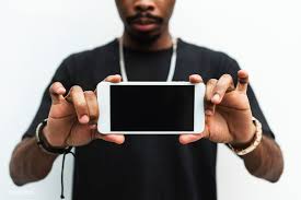 Download African Man Holding Mobile Phone Mockup Premium Image By Rawpixel Com Phone Photography Android Phone Mockup Mobile Phone