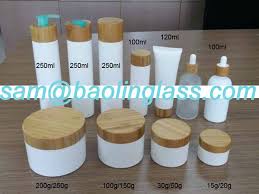 With a sleek and durable bamboo lid. Bamboo Lid Frosted White Glass Bottle Cream Jars
