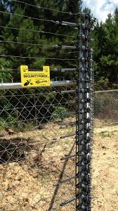 The first arm is the fence connected to the power terminal of the fence energiser. The Top Electric Fence Installation Company America Fence