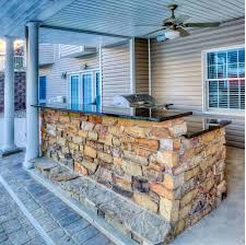 The home garden corner bar has an open front and side with access from the side. 25 Smart Outdoor Bar Ideas