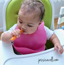 This Little Cutie Is Chomping Down On Some Fermented Vegetables Find Out The Benefits Of Fermented Food F Baby Led Weaning Sauerkraut Fermented Foods Benefits