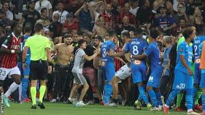 Marseille match was suspended after fans invaded the pitch and threw bottles in ugly incident. Yvijyyrrc6o1um