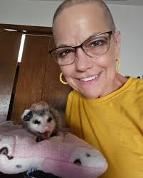 Tom has a small dog crate that he sleeps in sometimes. I replaced it with a  larger crate so he can stretch out. I took the door off so it won't close