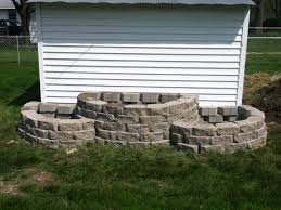 You can use plastic bordering and also river rocks to produce a contemporary appearance that aids your deck stick out from the yard. Raised Brick Beds Cheap And Easy A Little Over 200 In Materials 150 Retaining Wall Blocks Landscaping Retaining Walls Cheap Retaining Wall Garden Beds