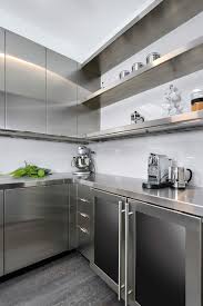 The modern stainless steel kitchens are a timeless classic. Highland Park Modern Kitchen Design Dresner Design Kitchen Design Custom Cabinetry Kitchen Interior Stainless Steel Kitchen Cabinets Kitchen Design