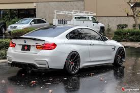 Alpine White Bmw M4 Surrounded By Vorsteiner Bits Carscoops Bmw M4 Bmw Bmw White