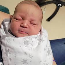 Marine's wife gives birth to baby three weeks after his death in  Afghanistan