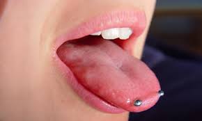 For those that don't know, horizontal tongue piercings are piercings that pass through the tip of the tongue, sometimes called scoop or snake eye piercings. Why Snake Eyes Piercing Is The One You Should Never Get Fmag Com