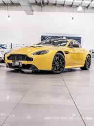 Image result for Yellow Tang 2021 Aston Martin