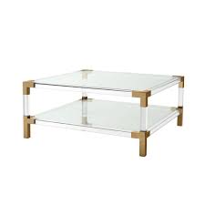 The metal frame of this sleek coffee table assures its durability. Eichholtz Royalton Coffee Table Brass Eichholtz Sweetpea Willow