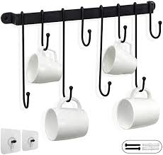 This allows you to drink hot coffee without. Kur217s43 Bk C1 P2 Kes Coffee Mug Rack 17 Inches Coffee Mug Holder Wall Mounted Coffee Cup Holder With 6 Cup Hooks Coffee Bar Decor Matte Black 2 Pack Mug Hooks Surclima Kitchen Dining