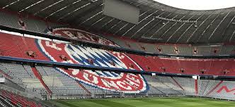 Specifically lit display of allianz arena logo: A Tour Of Bayern Munich S Allianz Arena And One Final Look Around Munich S Christmas Markets A Travelling Jack