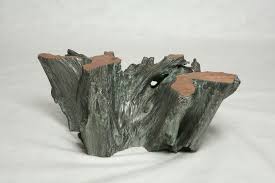 Coffee tables are quite a commonplace these days and serve a purpose while making the decor look good. Hand Made Silver Covered Tree Trunk Coffee Table By Jose Eguez Ebanista Custommade Com
