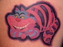 26 Staggering Cheshire Cat Tattoo Ideas