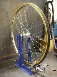 If you're at home or out on the trail you can touch up your wheel and get it rideable again by using your brakes as a wheel truing stand. Scrap Metal Challenge Diy Bike Wheel Truing Stand Tuckamoredew