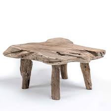The wood panel tabletop features a rich, natural finish that adds warmth to your living space. Gommaire Natural Shape Coffee Table Luxury Outdoor Living