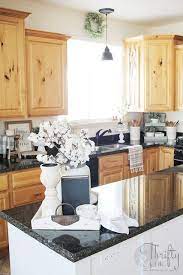 Kitchen Decor And Updates Embracing What I Have Black Kitchen Countertops Kitchen Counter Decor Kitchen Decor Modern