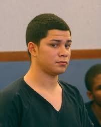 Three suspects charged in teacher's death appear in court