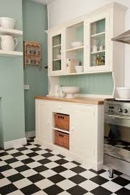 Black And White Checkered Tile Lowes I Must Really Love The Black And White Checkered Floor Because I Gravitate Towards Images Of I Checkered Floor Kitchen Freestanding Kitchen Kitchen Floor Tile