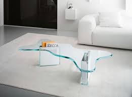 This isn't the perfect table just because it's named after the person who came up with the word magazine, it's multifunctional and stylish. Contemporary Coffee Table Splash Tonelli Design Glass With Magazine Rack By Karim Rashid
