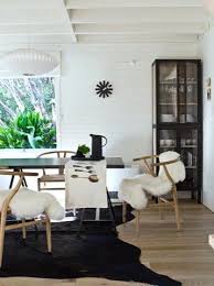 Hans Wegner S Wishbone Chair Black And White Dining Room Scandinavian Dining Room White Dining Room