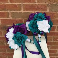 You can take traditional white roses as a basis and complement the purple color is very rare for a car so that you can opt for white or black cars. Angel Isabella Usa Build Your Wedding Package Plum Ivory Oasis Etsy Teal Wedding Flowers Purple Bridal Bouquet Artificial Flowers Wedding
