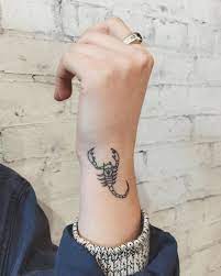 Scorpion tattoos for men hold so much meaning into them, apart from the unique beauty of the animal itself. Hand Poked Scorpion Tattoo On The Wrist