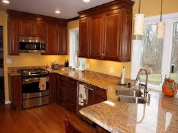 Pin By Kim Schneider Moore On For The Home Cherry Cabinets Kitchen Wall Color Cherry Cabinets Kitchen Yellow Kitchen Walls