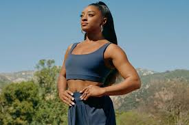 Simone Biles Wears Bikini and Chanel Bucket Hat on Beachy Girls Trip