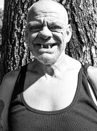 Money Clerk at fish reseller stall.