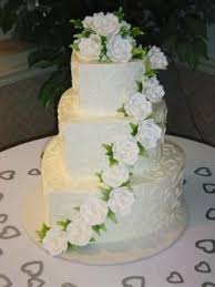 White wedding cake cascading flowers. Pin By Lisa Crosby On Cakes Hearts Heart Shaped Wedding Cakes Heart Wedding Cakes Wedding Cake Fresh Flowers