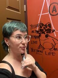 Overseen: Some great bar bathroom graffiti.