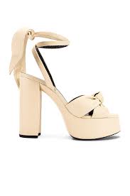 Platforms were the heel of choice back in the '70s because they were so comfortable to dance in. Saint Laurent Bianca Platform Sandals In Light Cream Fwrd Platform Sandals Leather Platform Sandals Saint Laurent
