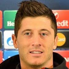 Robert lewandowski is a polish professional footballer who plays as a striker for bayern munich and is the captain of the poland national team. Robert Lewandowski Bio Family Trivia Famous Birthdays