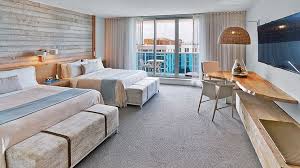 The living space of our sensational 2 bedroom suite features balcony with views of south beach. Pin On Guest Room