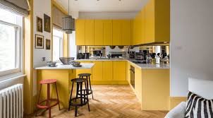 Why It S Time To Go Monochrome Yellow Kitchen Cabinets Tuscan Kitchen Small Dining Room Decor