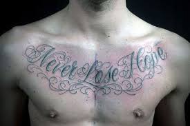 Top 11 chest tattoo designs 1. Hope Quote Tattoos For Men Tattoo Quotes Writing Tattoos Hope Tattoo